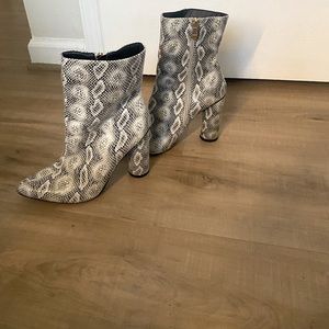 Snakeskin booties good condition no rips or tears little wear on bottom of shoes